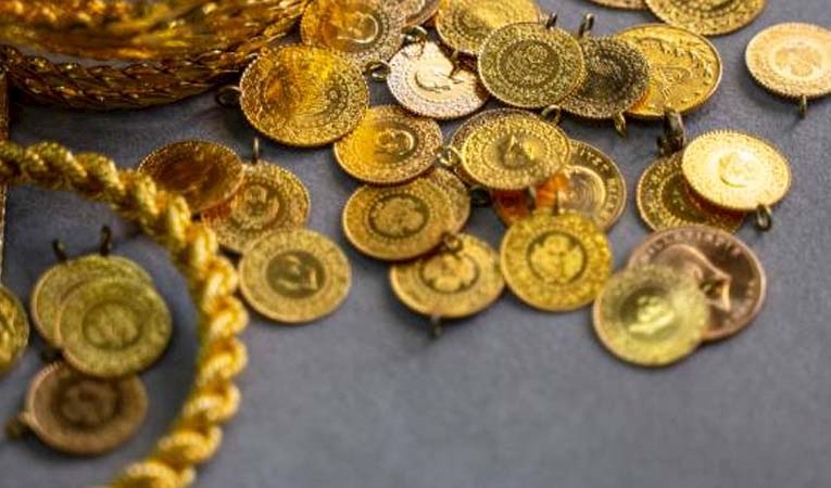 Altının ons fiyatı ateşkes iyimserliğiyle yaklaşık 2 haftanın en düşük seviyesine geriledi